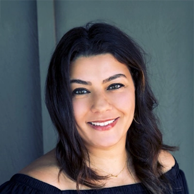 A headshot photo of Dr. Genevieve Abi-Nahed, a dentist at Great Smile Dental